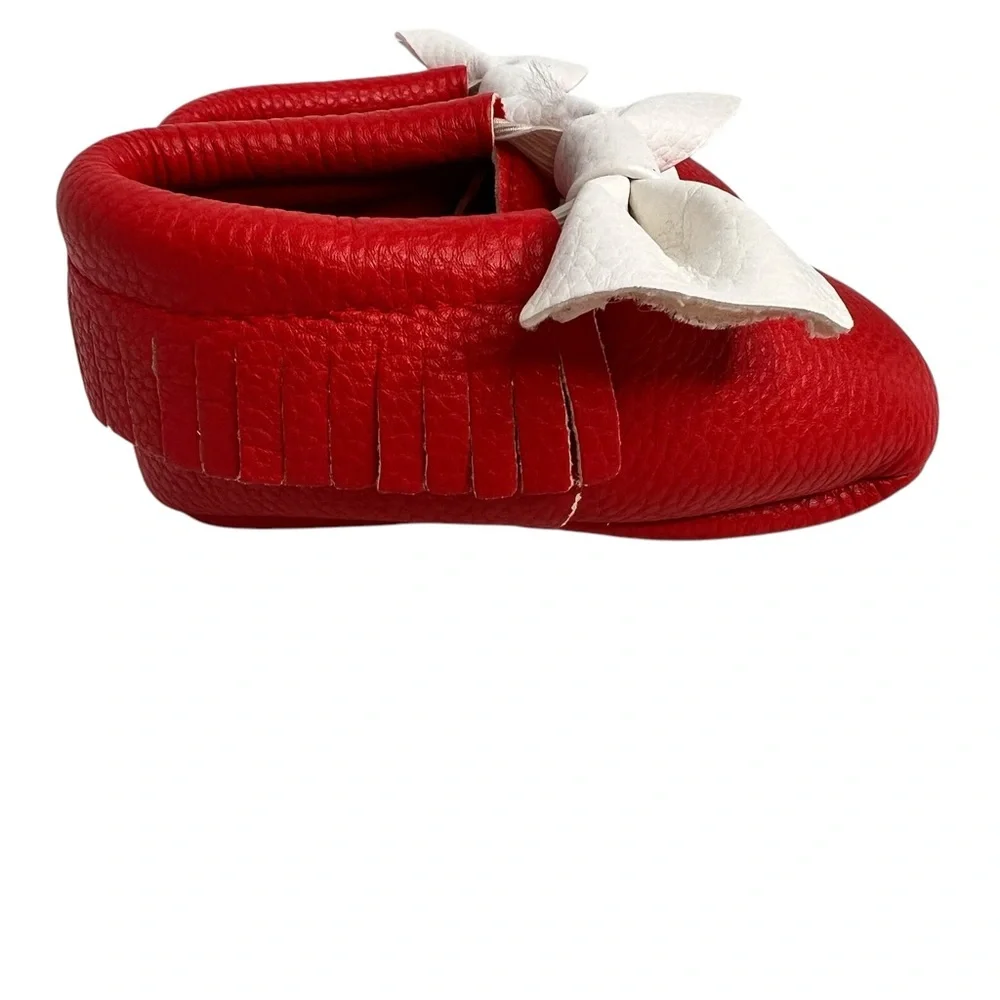 Red Romirus soft sole moccasins W/bow& Fringe